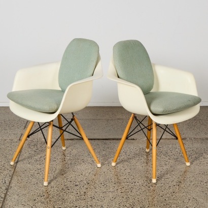 A Pair of Eames Style Chairs