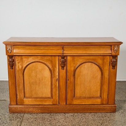 A Carved Oak Two-Door Sideboard