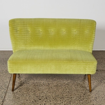 A Mid-Century Style Two Seater Sofa
