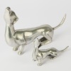 A Pair of Metal Dachshunds