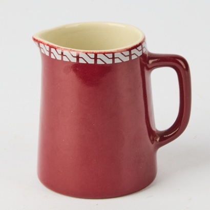 A Rare Plum Crown Lynn Railway Milk Jug