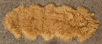 A Double Caramel Coloured Tibetan Lamb Rug