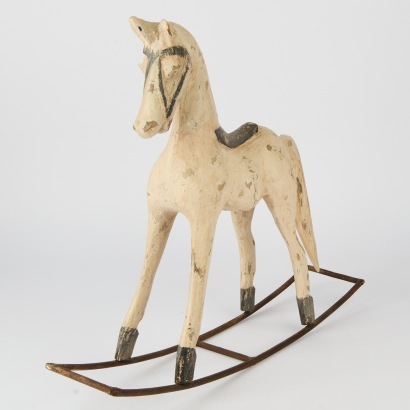 A Folk Art carved Wooden Rocking Horse