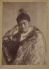FOY BROTHERS Portrait of Māori woman identified as Hare Paori, wearing a korowai and two feathers in her hair
