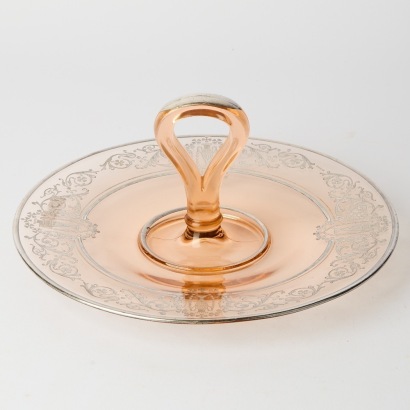 A Pink Uranium Glass Cake Plate with Sterling Silver Patterning