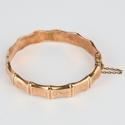 A Vintage 9 Karat Rose Gold Bamboo Form Bangle