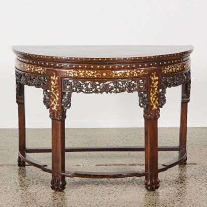 A Late 19th to Early 20th Century Chinese Hardwood and Mother-of-Pearl Inlaid Carved Demi-lune Table