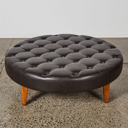 A David Shaw Circular Leather Button Back Ottoman
