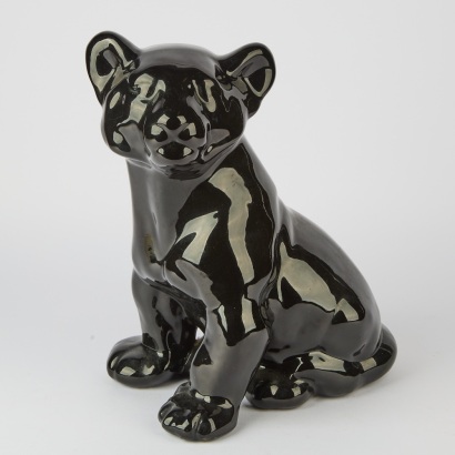 A Black Lion Cub Statue