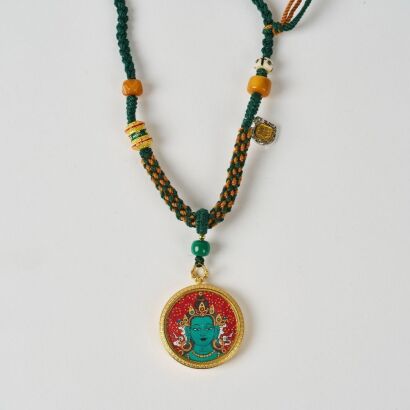 A Chinese Tibetan Circular Green Tara Pendant