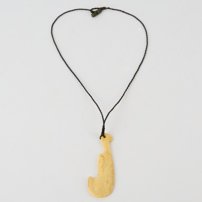 A Whale Bone Whale Bone Wahaika Pendant