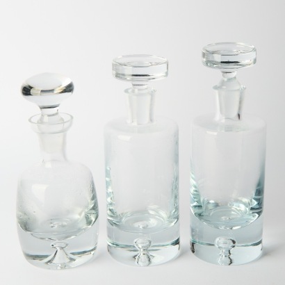 A Collection of Three Spirit Decanters with Glass Stoppers