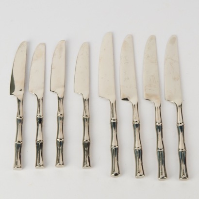 A Collection of eight Stainless Bamboo Handled Knives
