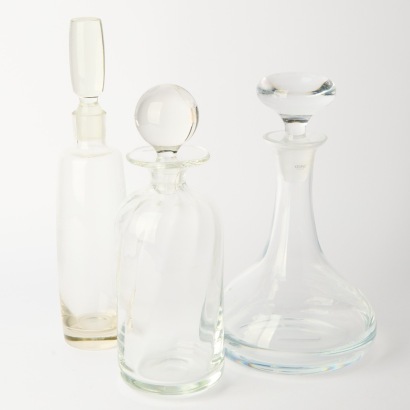 A collection of three Decanters with Glass Stoppers