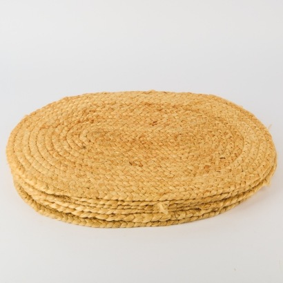 A Set of Six Woven Oval Placemats