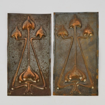 A Pair of Pressed Art Nouveau Relief Panels
