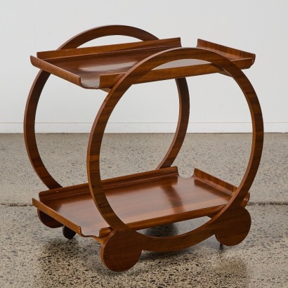 An Walnut Art Deco Tea Trolley By Christie Industries