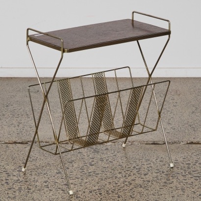 A Mid-Century Metal Magazine Rack