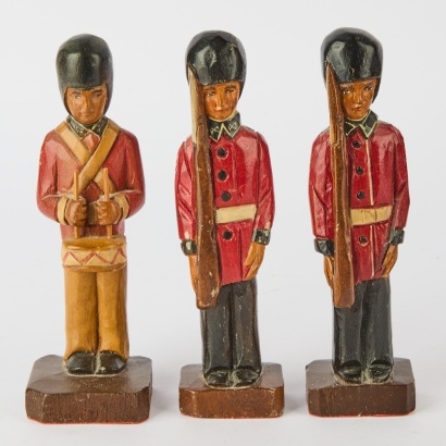 A Set of Three Vintage Handmade Wooden Soldiers