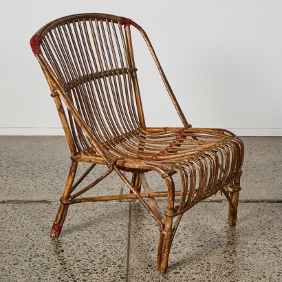 A Vintage Tiger Cane Chair
