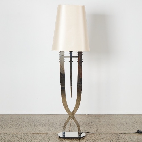 A Sculptural Mirrored Floor Lamp