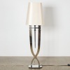 A Sculptural Mirrored Floor Lamp
