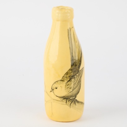 A Paper Mache Milk Bottle Shape
