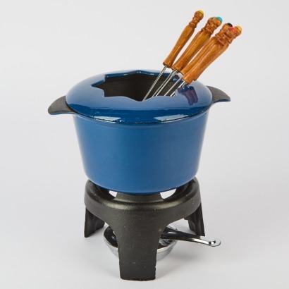 A Blue Enamel Cast Iron Fondue Set