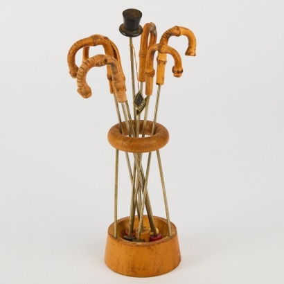 A Mid-Century Biko Walking Stick and Stand Swizzle Stick Bar Set