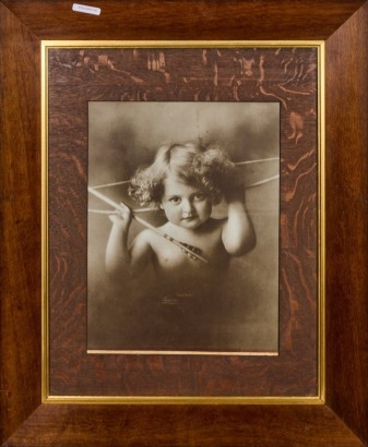 A Pair of Vintage Framed Cupids Photos