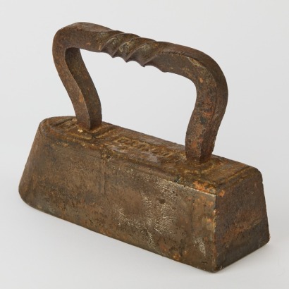 A Cast Iron Tailor's Iron Doorstop
