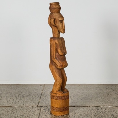 A Hand Carved South East Asian Figure