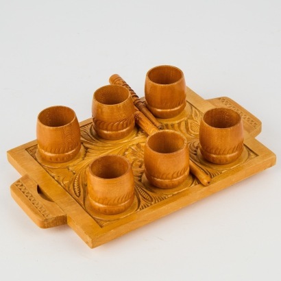 A Hungarian Wooden Folk Art Egg Tray with Two Utensils