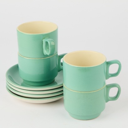 A Collection of Four Crown Lynn Cups and Saucers