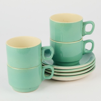 A Collection of Four Crown Lynn Cups and Saucers