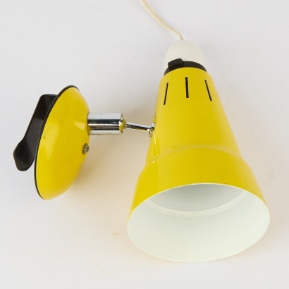 A Vintage Desk-Mounted Yellow Lamp