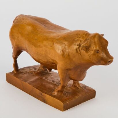 A Handmade Vintage Myrtlewood Cow Statue