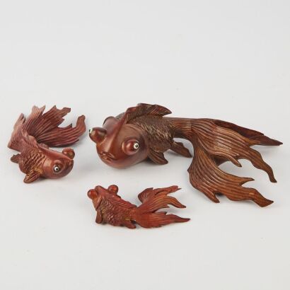 A Set of Three Wooden Koi Fish