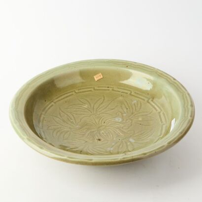 A Chinese Ming Dynasty Longquan Celadon Carved Large Dish