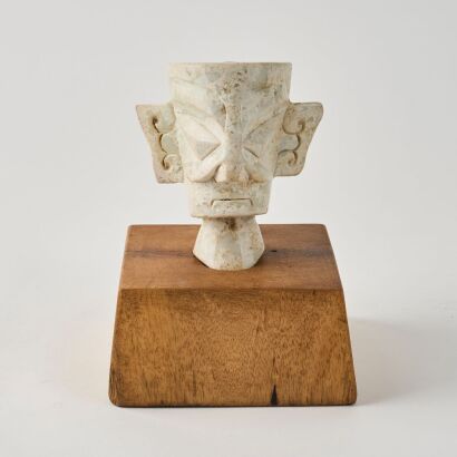 A Chinese San-xing-dui Style Jade Carved Head