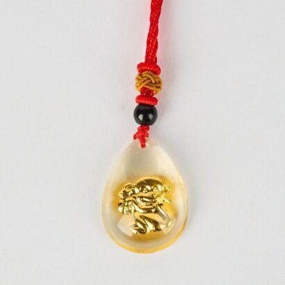 A Chinese Gilt Monkey Pendant