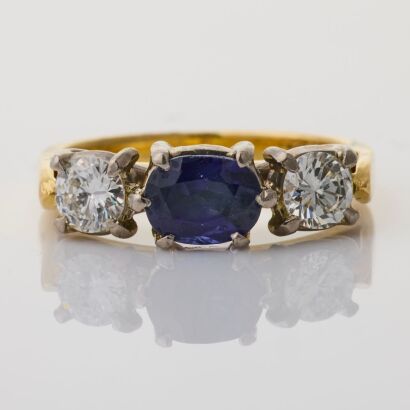 18ct White / Yellow Gold, 0.98ct Sapphire / 0.59ct Diamond Three Stone Ring
