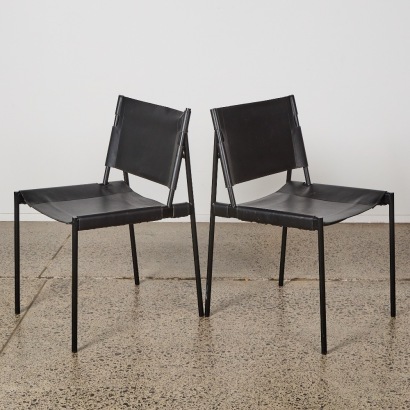 A Pair of Black Leather MCM Sling Chairs