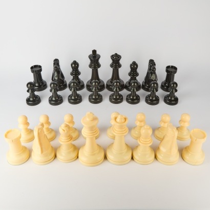 A Large 32 Piece Chess Set with Felted Bases