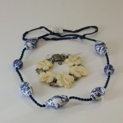 A Chinese Blue and White Porcelain Bead Necklace AND A Chinese Ivory Carved Floral Bracelet