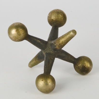 A Large Vintage Cast Iron Jacks Bookend, designed by Bill Curry