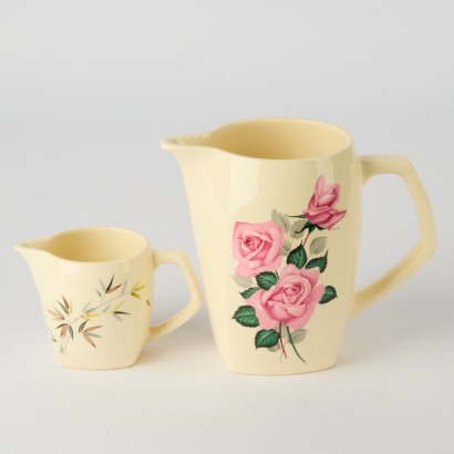 A Pair of Crown Lynn Floral Jugs