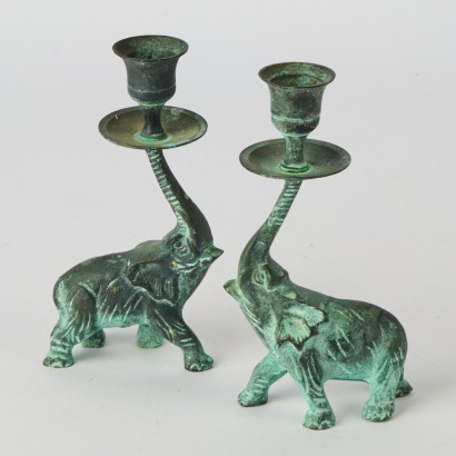 A Pair of Green Patina Bronze Elephant Candlestick Holders