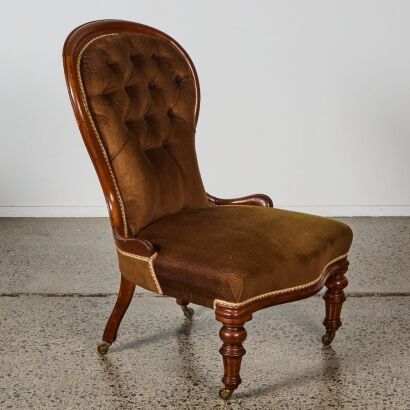 A Victorian Walnut Spoon-Back Nursing Chair