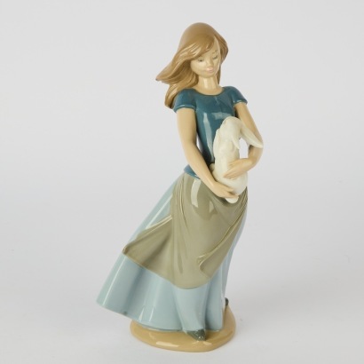 A Lladro Country Girl with Bunny Figurine
